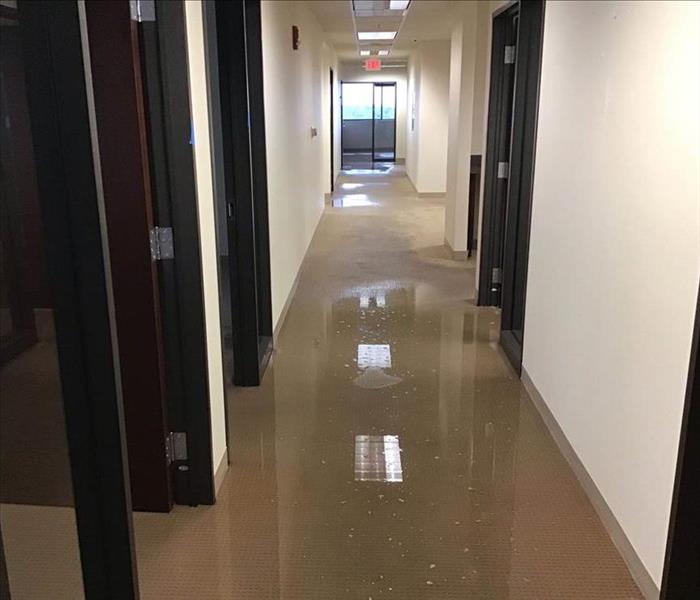 Hallway with standing water.