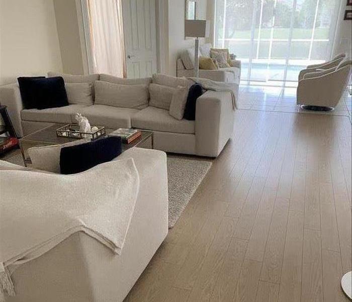 The living room of a Deerfield Beach home after it was restored from water damage.