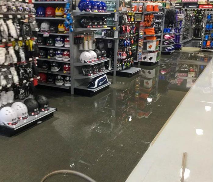 Flood water on the floor of a Deerfield Beach, FL business